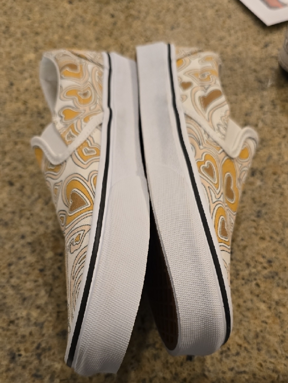 Vans White Canvas Slip-Ons with Yellow Heart Swirl Print - Picture 3 of 8